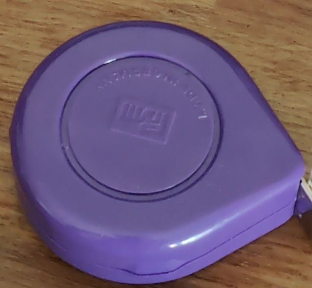 Purple retractable tape measure 1